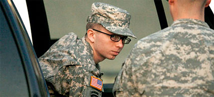 Bradley Manning is escorted from a military vehicle to the court facility at Fort Meade, 12/21/11. (photo: Patrick Semansky/AP)