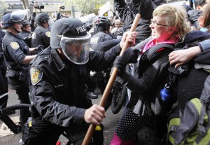 COP IN RIOT GEAR: TRAINED IN ISRAEL  TO KILL AND MAIM AMERICANS (Click to expand)