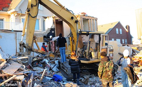 Destruction: Thousands are still without power in New York City and Long Island after Superstorm Sandy's devastation 