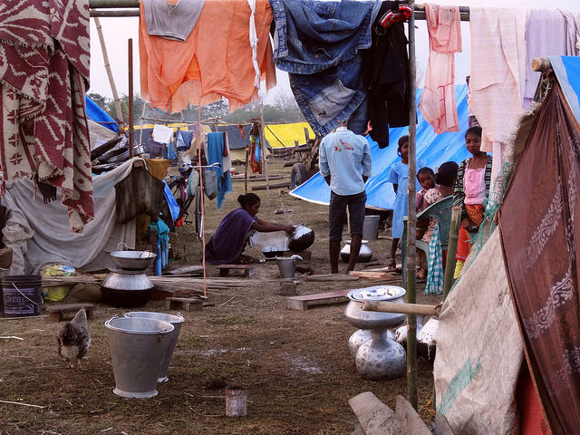 Hunger is constant in the refugee camps, with meagre rations of rice, lentils, cooking oil and salt falling short of most families basic needs. Women are forced to walk long distances to fetch firewood for woodstoves. Credit: Priyanka Borpujari/IPS